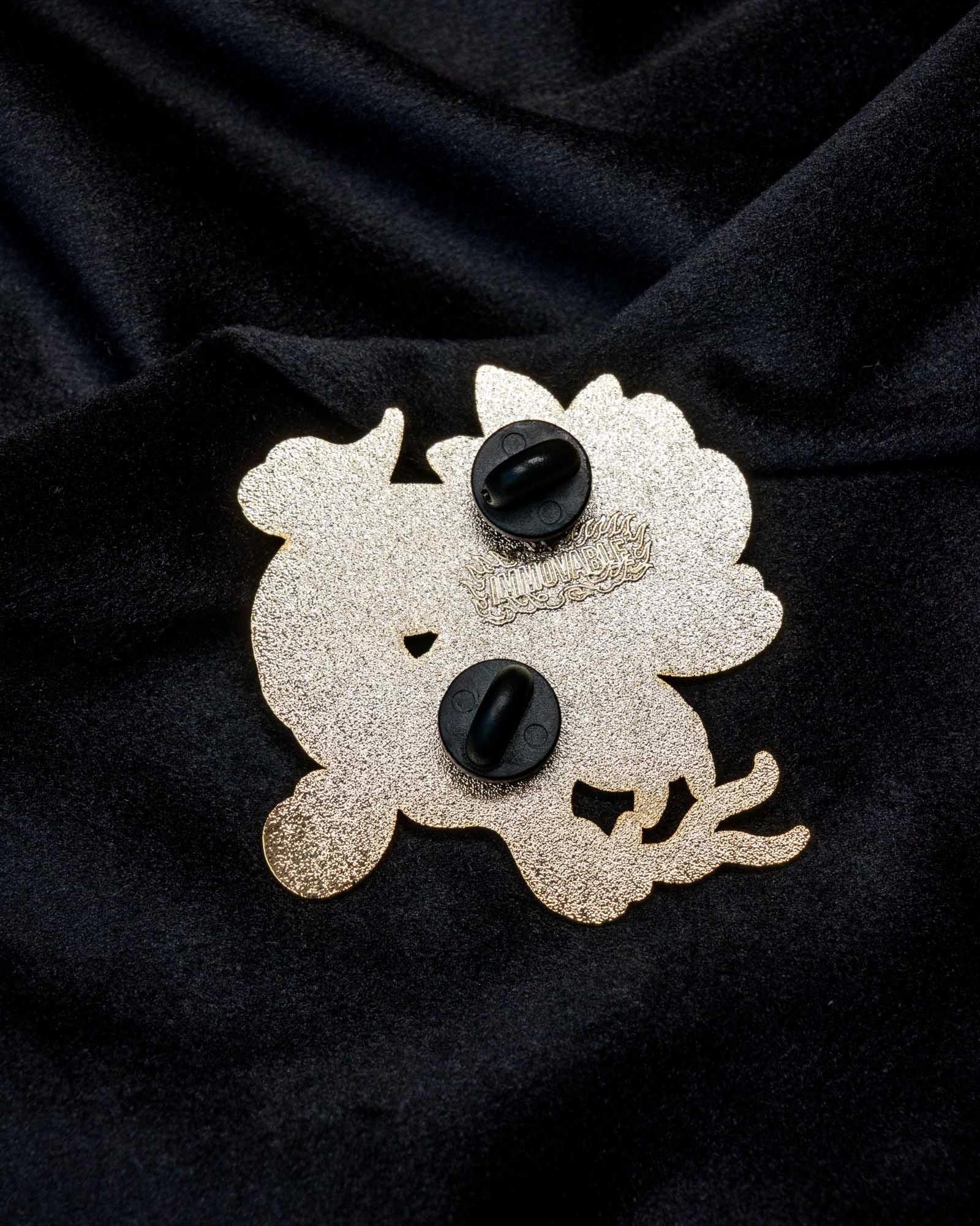 Snake and Peony enamel pin from the Immovable collection by Geoffrey Wong, showing a coiled serpent intertwined with a peony flower symbolizing balance between strength and beauty.