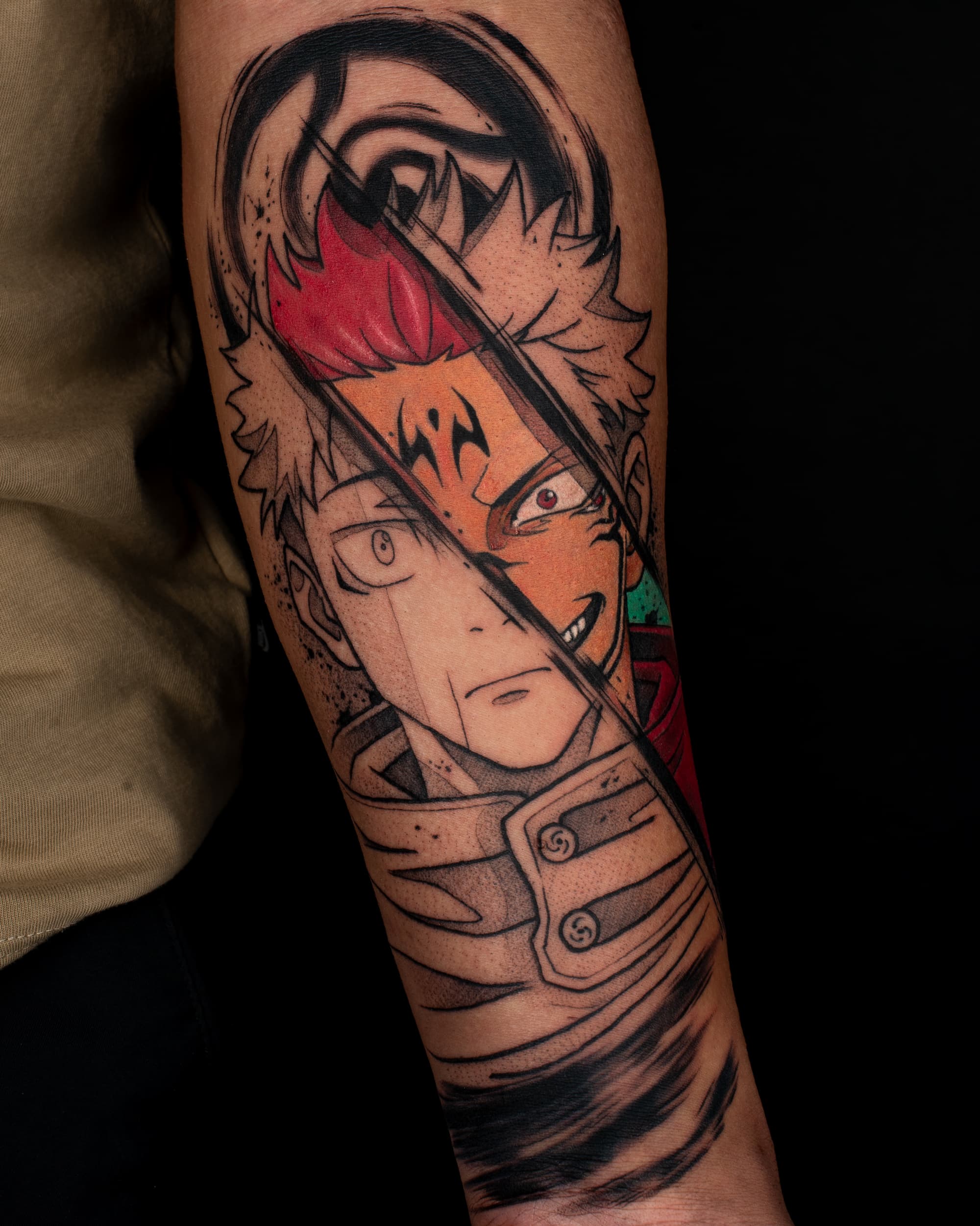 anime jujutsu kaisen tattoo on forearm done at 46 tattoo toronto