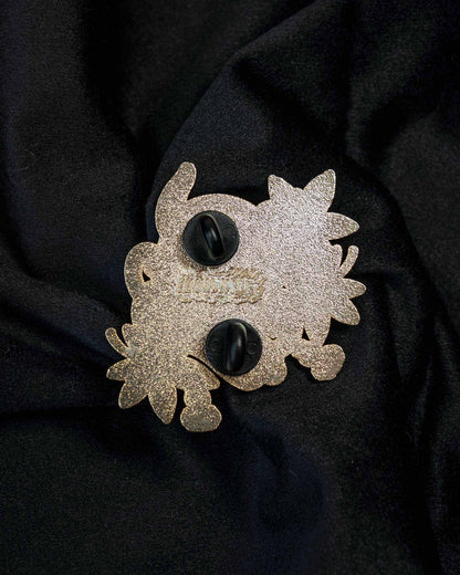 Hannya Mask enamel pin from the Immovable collection by Geoffrey Wong, featuring a traditional Japanese mask design expressing the duality of rage and sorrow.