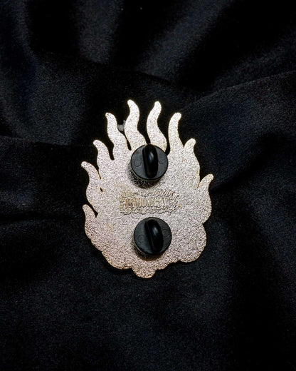 Hōju enamel pin from the Immovable collection by Geoffrey Wong, featuring a flaming sacred jewel with dragon details symbolizing wisdom and prosperity.