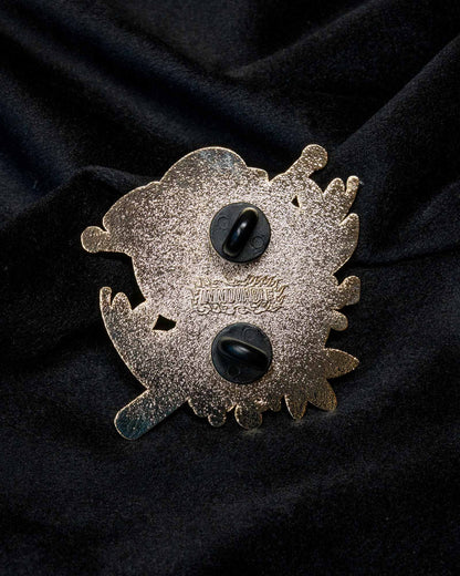 Namakubi enamel pin from the Immovable collection by Geoffrey Wong, depicting a traditional Japanese severed head motif that represents courage, honor, and impermanence.