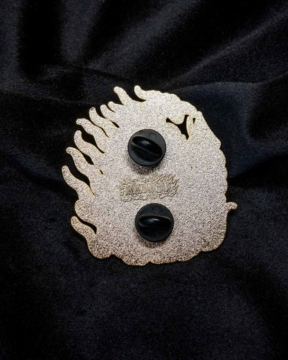Fudō Myōō enamel pin from the Immovable collection by Geoffrey Wong, featuring a Japanese tattoo-inspired protector deity surrounded by flames.